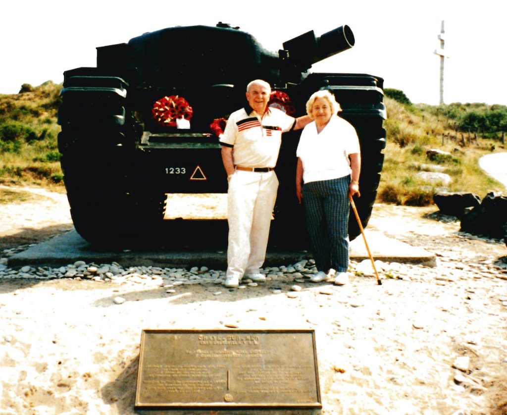 Doug and Brenda on Juno Beach in Normandy, in front of a Churchill tank