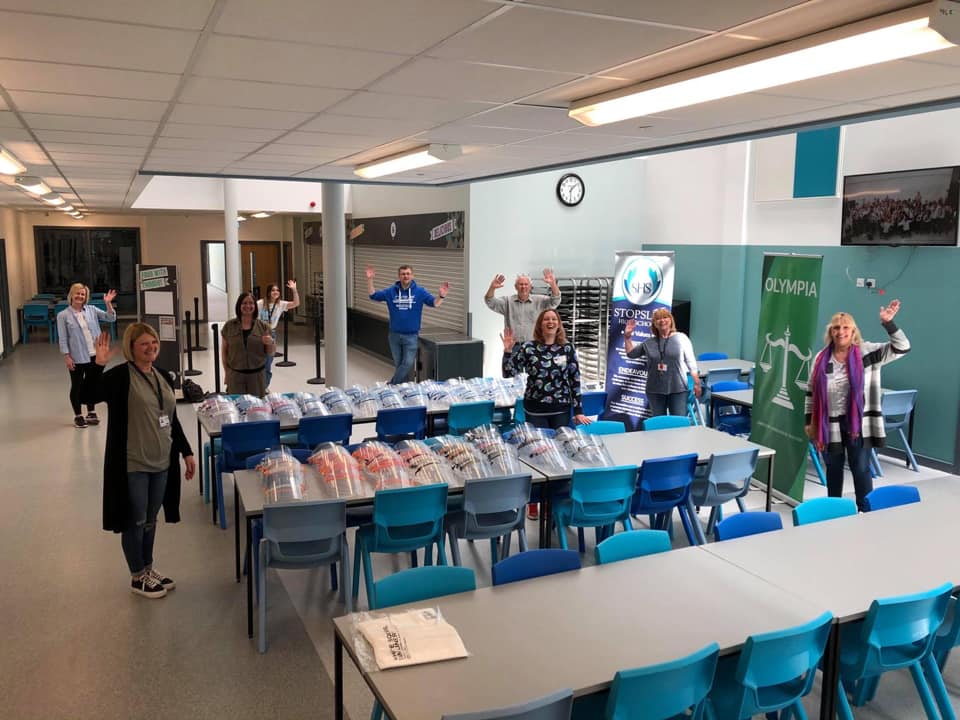 Volunteers helping to make PPE